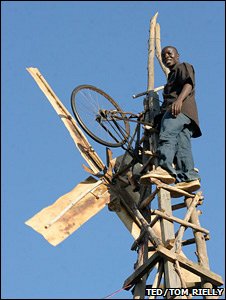 William Kamkwamba on his windmill (TED/Tom Rielly)